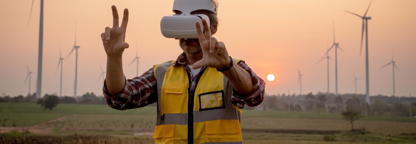 Engineer With VR Wind Turbines In The Background